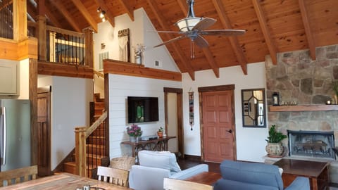 Living Room with beautiful fireplace and open concept living space.