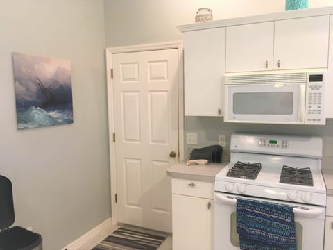 Kitchen and access to garage