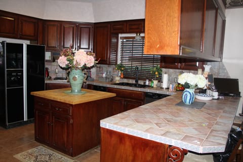 Kitchen area with barstools