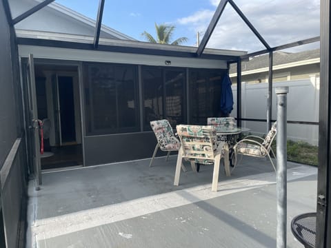 Screened lanai with Grill/ BBQ. Portable propane does not provide. private area.
