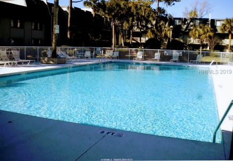 outdoor community pool , access from the back balcony or through the courtyard from the street.