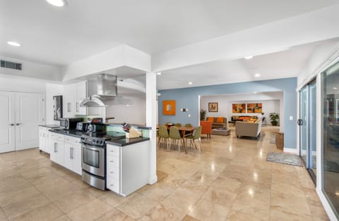 Spacious kitchen opens to other living spaces so you are connected while cooking