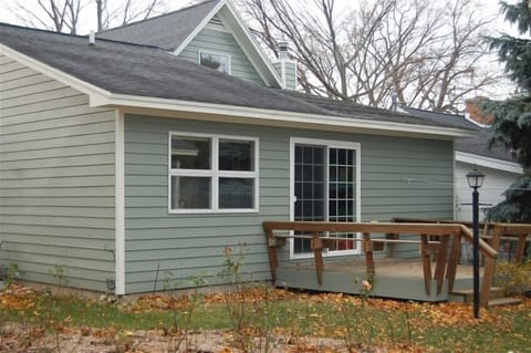 Deck, grill, fenced in yard, rose garden, and a wagon for going to the beach.
