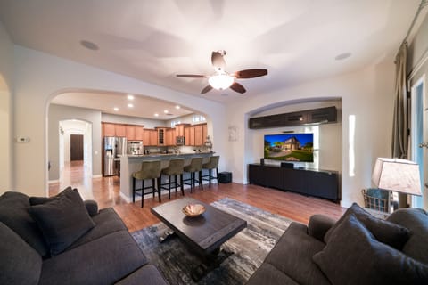 Family Room Open to Kitchen with 4 Person Breakfast Bar