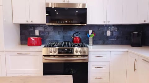 Handmade backsplash from Spain delights with a variety of blue designs and hues.