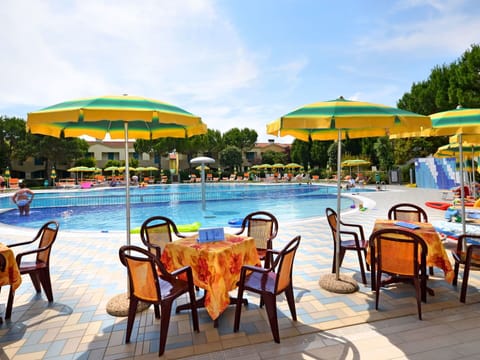 Cloud, Water, Sky, Furniture, Property, Chair, Swimming Pool, Table, Azure, Umbrella