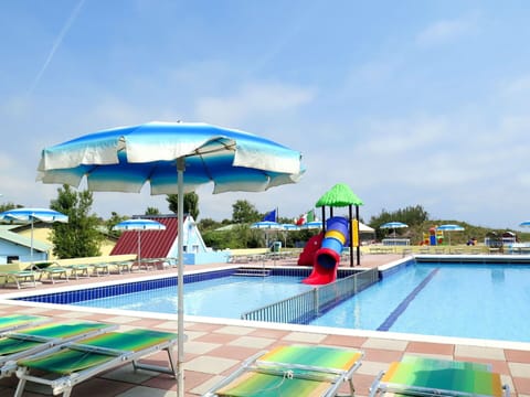 Water, Sky, Cloud, Swimming Pool, Plant, Umbrella, Outdoor Furniture, Shade, Building, Tree
