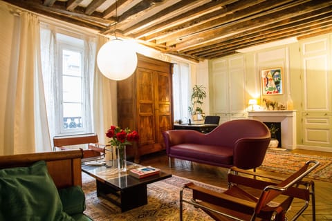 Behind the sofa, a huge desk for 1 or 2 people.
