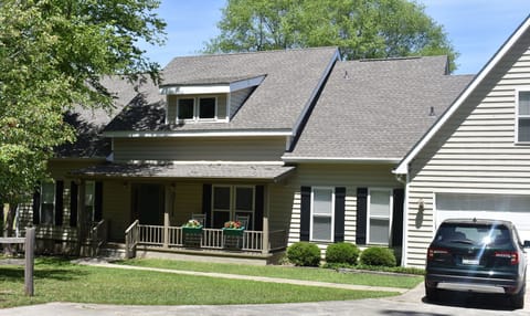 Front of house with spacious parking