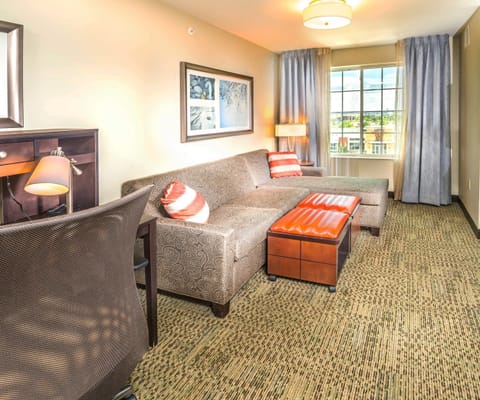 Sink into the cozy sofa after a day exploring the area.