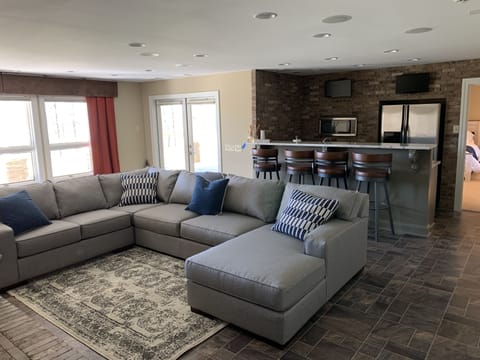 Basement living room
Couch is a pullout bed
Fridge, dishwasher & microwave 