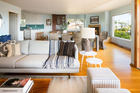 Living room opens up to the dining area and kitchen.