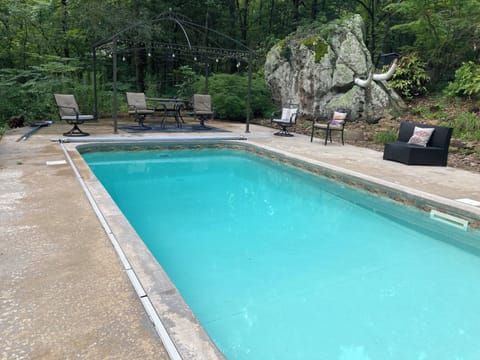 In ground swimming pool.
Located up a path behind main house.
8' deep no diving!