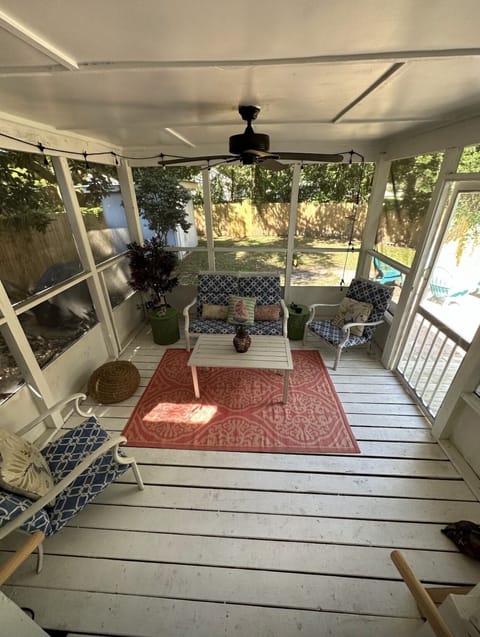 Outside screened deck. Fire pit outside deck.