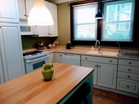 well stocked kitchen. coffee maker and coffee provided