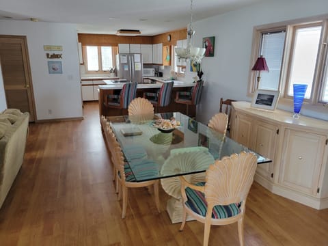 Dining room spanning into kitchen (view from Carolina room)