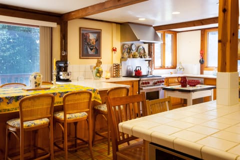 From East Deck enter HUGE KITCHEN:   6-Burner Wolf Stove/Oven, Dish Washer, Sink