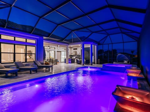 Evening pool with LED lights and light up water bowls for added effects.