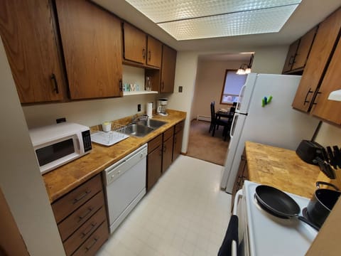 KP101APT3 - Kitchen with Stove, Oven, Dishwasher, Refrigerator/Freezer, and Kitchen Essentials