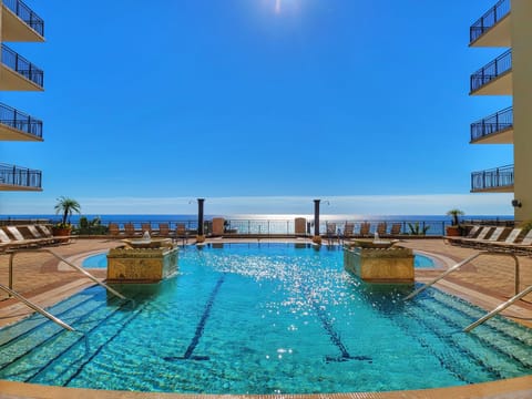 Infinity pool on the 4th floor overlooking the ocean!