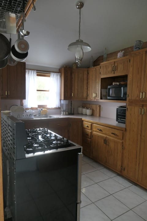 Kitchen with gas stove and dishwasher
