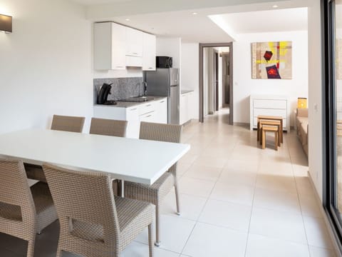 Table, Furniture, Chair, Kitchen, Couch, Picture Frame, Flooring, Cabinetry, Interior Design, Architecture