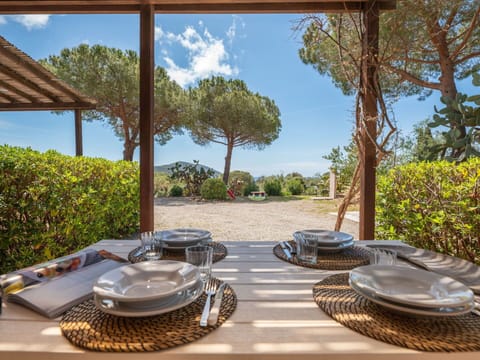 Sky, Plant, Property, Tableware, Table, Dishware, Shade, Outdoor Furniture, Arecales, Cloud