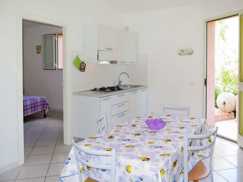 Furniture, Room, Property, Floor, Interior Design, Wall, Yellow, Purple, Building, Table