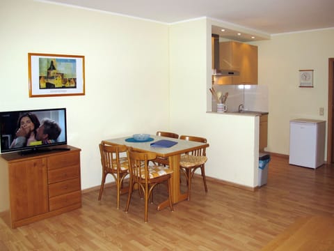 Room, Furniture, Floor, Property, Hardwood, Wood Flooring, Building, Interior Design, Table, Laminate Flooring