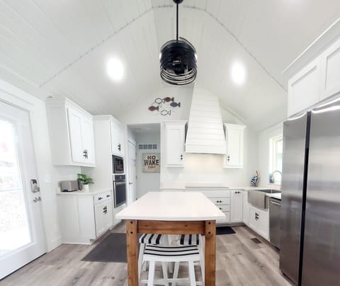 Beautiful vaulted ceiling, a fandelier, and dimmable lights throughout.