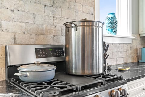 Lots of pots and pans to feed a crowd including a HUGE crab pot