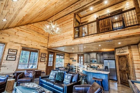 The open living room offers the perfect gathering space for family and friends.