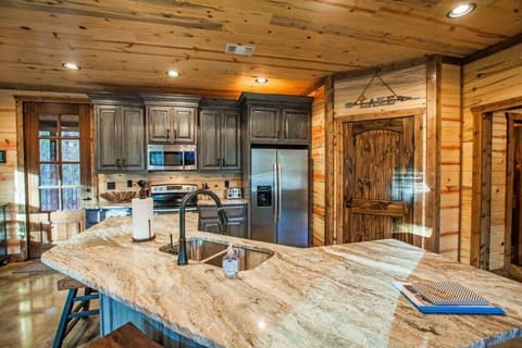 The fully stocked kitchen makes preparing meals for your group easy and enjoyable.