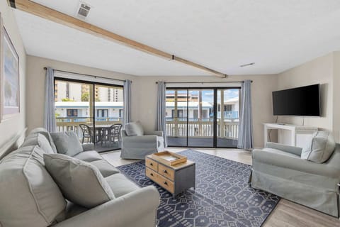 Brand New Sofa and Club Chairs and plenty of natural light!