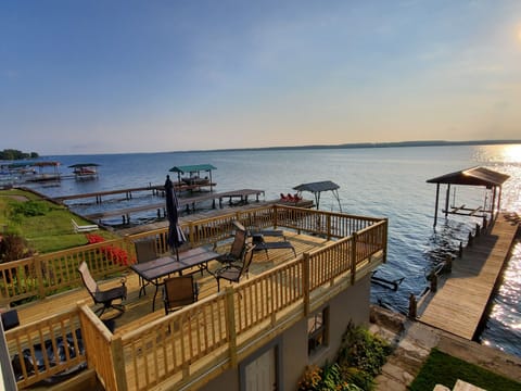 Brand new beautiful upperboat house deck with grill and lots of seating 