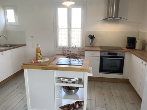 Kitchen, Countertop, Kitchen Appliance, Furniture, Flooring, Cabinetry, Interior Design, Major Appliance, Wood, Home Appliance