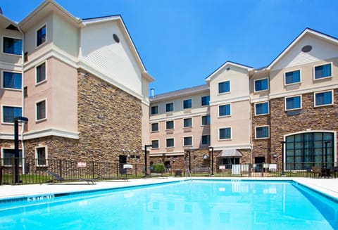 Dive into relaxation at the sparkling pool, perfect for sunny afternoons.