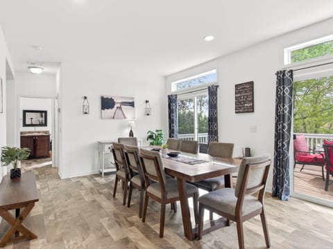 The bright and spacious dining area with access to the utility room and laundry 