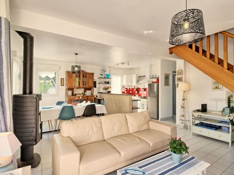 Property, Furniture, Picture Frame, Couch, Interior Design, Table, Lighting, Living Room, Floor, Shelving