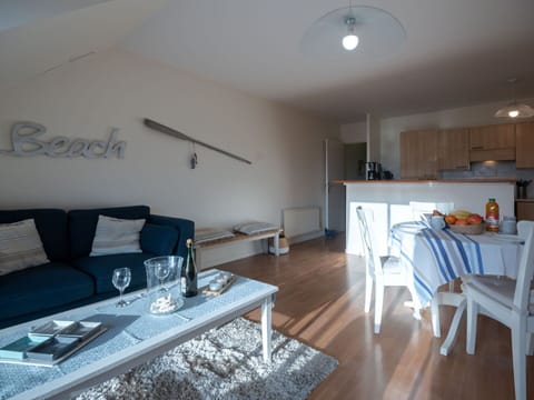 Table, Furniture, Property, Azure, Interior Design, Living Room, Lighting, Cabinetry, Couch, Wood