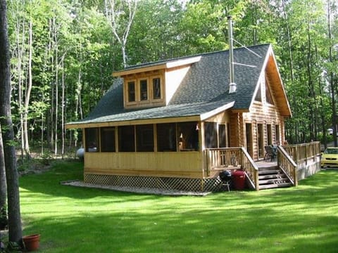 view of screened in porch and deck