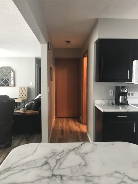 Kitchen view towards Bedroom 3 and Bathroom 3.