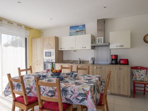 Wood, Furniture, Chair, Interior Design, Flooring, Kitchen & Dining Room Table, Wood Stain, Hardwood, Dining Room, Houseplant