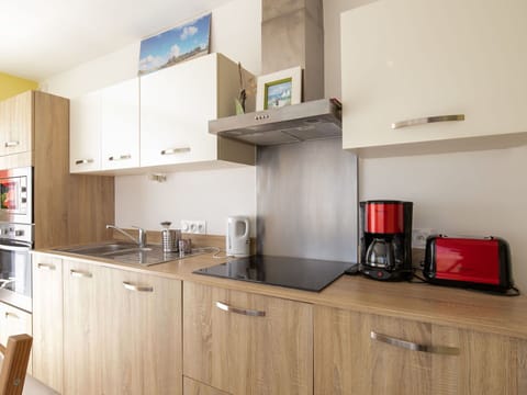 Kitchen, Kitchen Appliance, Countertop, Cabinetry, Furniture, Major Appliance, Interior Design, Flooring, Wood, Home Appliance