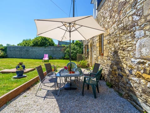 Plant, Furniture, Table, Property, Outdoor Table, Outdoor Furniture, Shade, Chair, Tree, Building