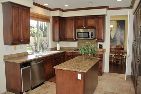 Kitchen with door open to formal dining room