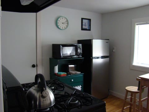 Kitchen - Refrigerator, Microwave and Gas stove