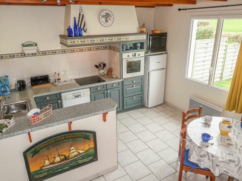 Furniture, Cabinetry, Property, Table, Window, Countertop, Chair, Interior Design, Kitchen, Kitchen Stove