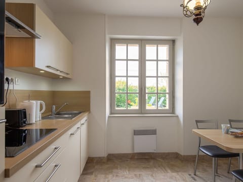 Cabinetry, Furniture, Property, Window, Countertop, Table, Building, Wood, Sink, Interior Design