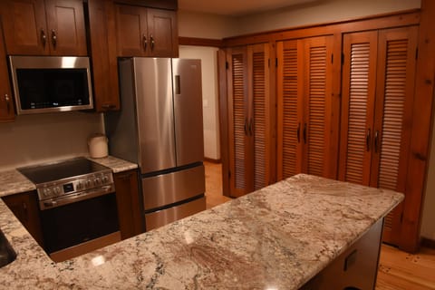 Another view of kitchen area with ample pantry space.
